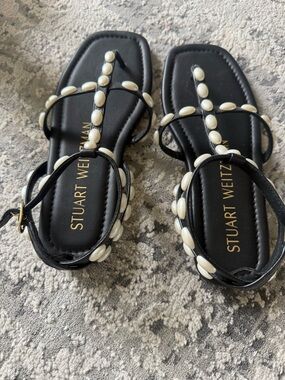 Stuart Weitzman Black Leather T-Strap Sandals with Pearl Embellishments